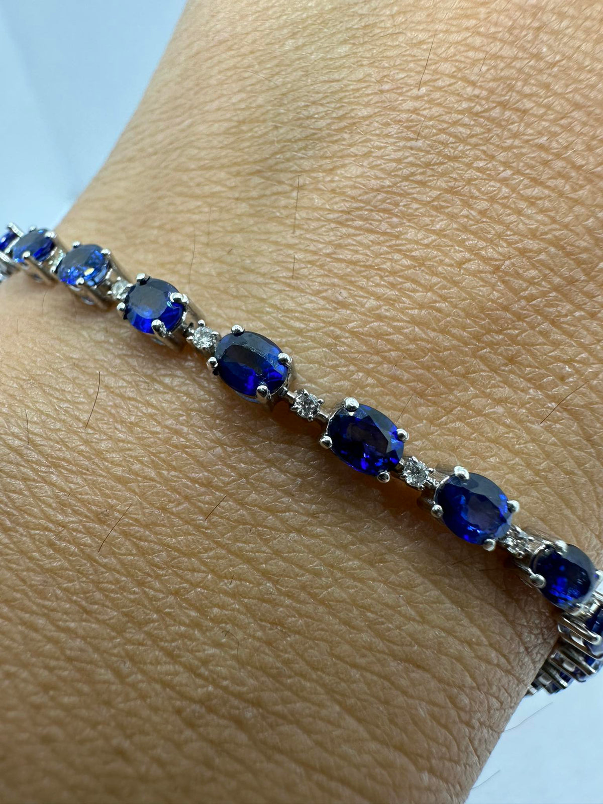 Bracciale Tennis Donna Oro 18KT con Diamanti ct 0.22 e Zaffiri Ct. 5.70