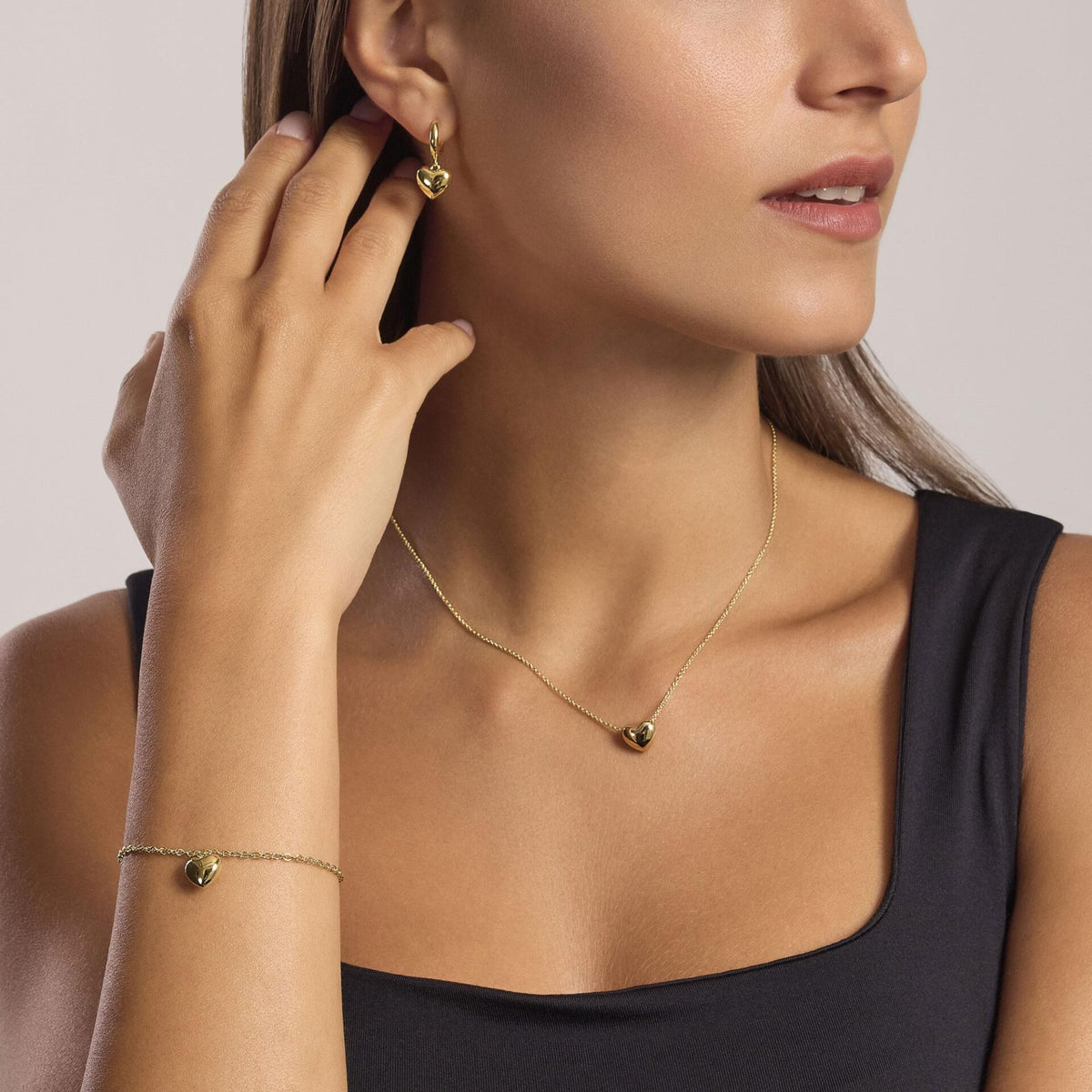 Orecchini a Cerchio Mabina in Argento Dorato con Cuore Pendente