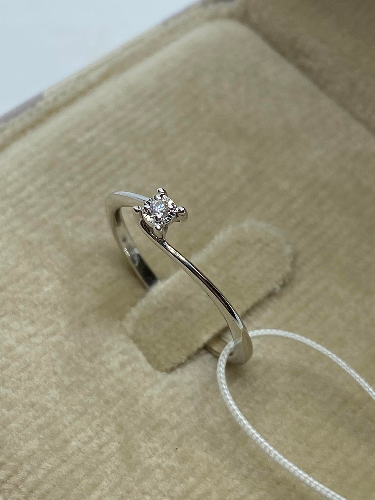 18KT Gold Women's Solitaire Ring with 0.02 Ct. Diamond
