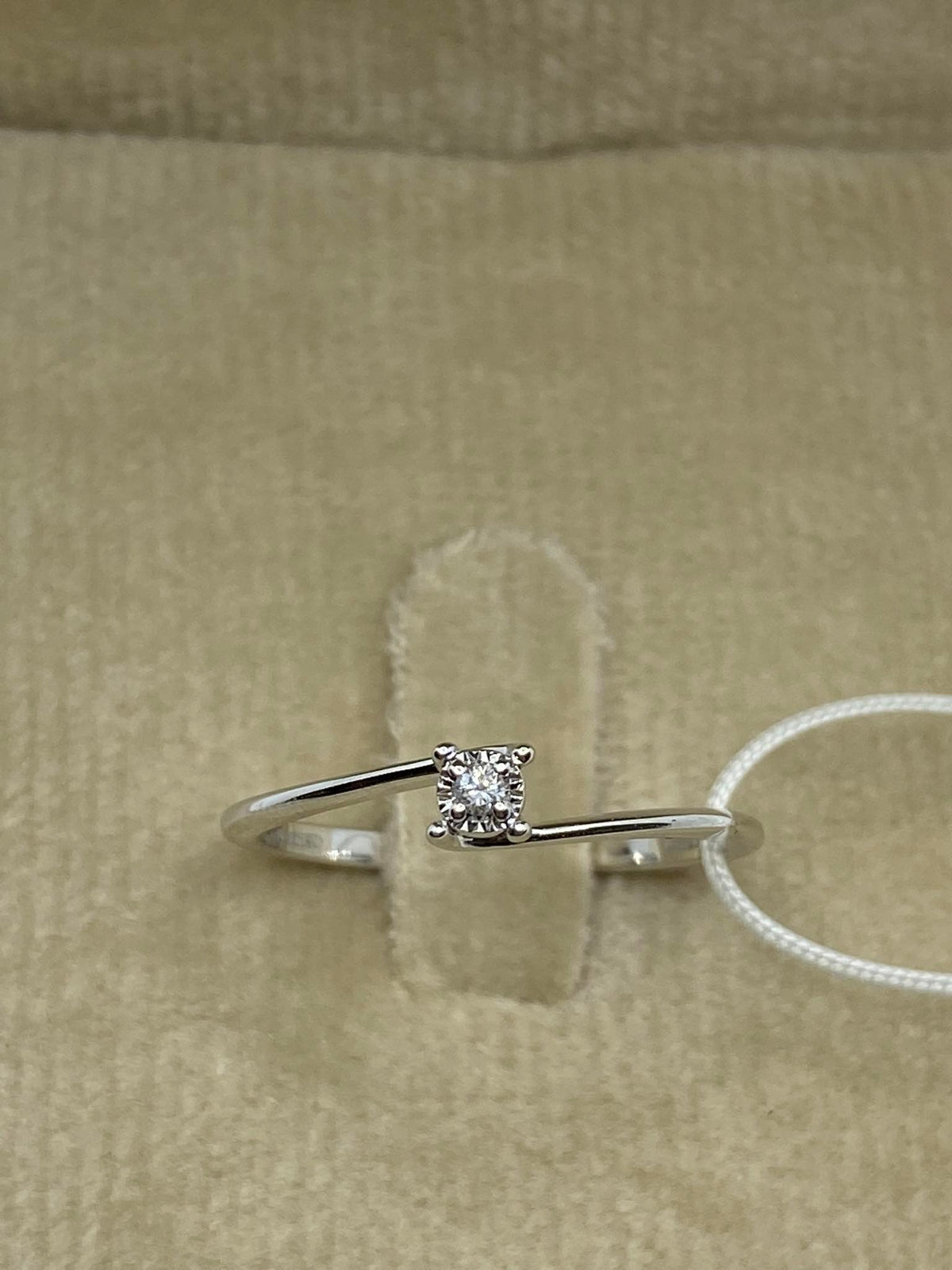 18KT Gold Women's Solitaire Ring with 0.02 Ct. Diamond