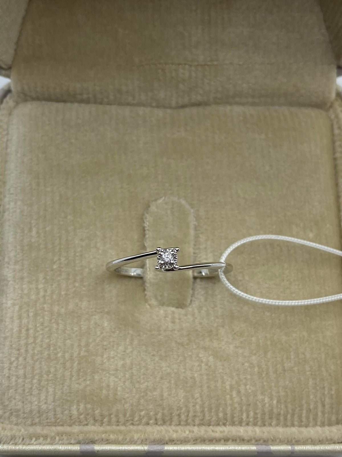 18KT Gold Women's Solitaire Ring with 0.02 Ct. Diamond