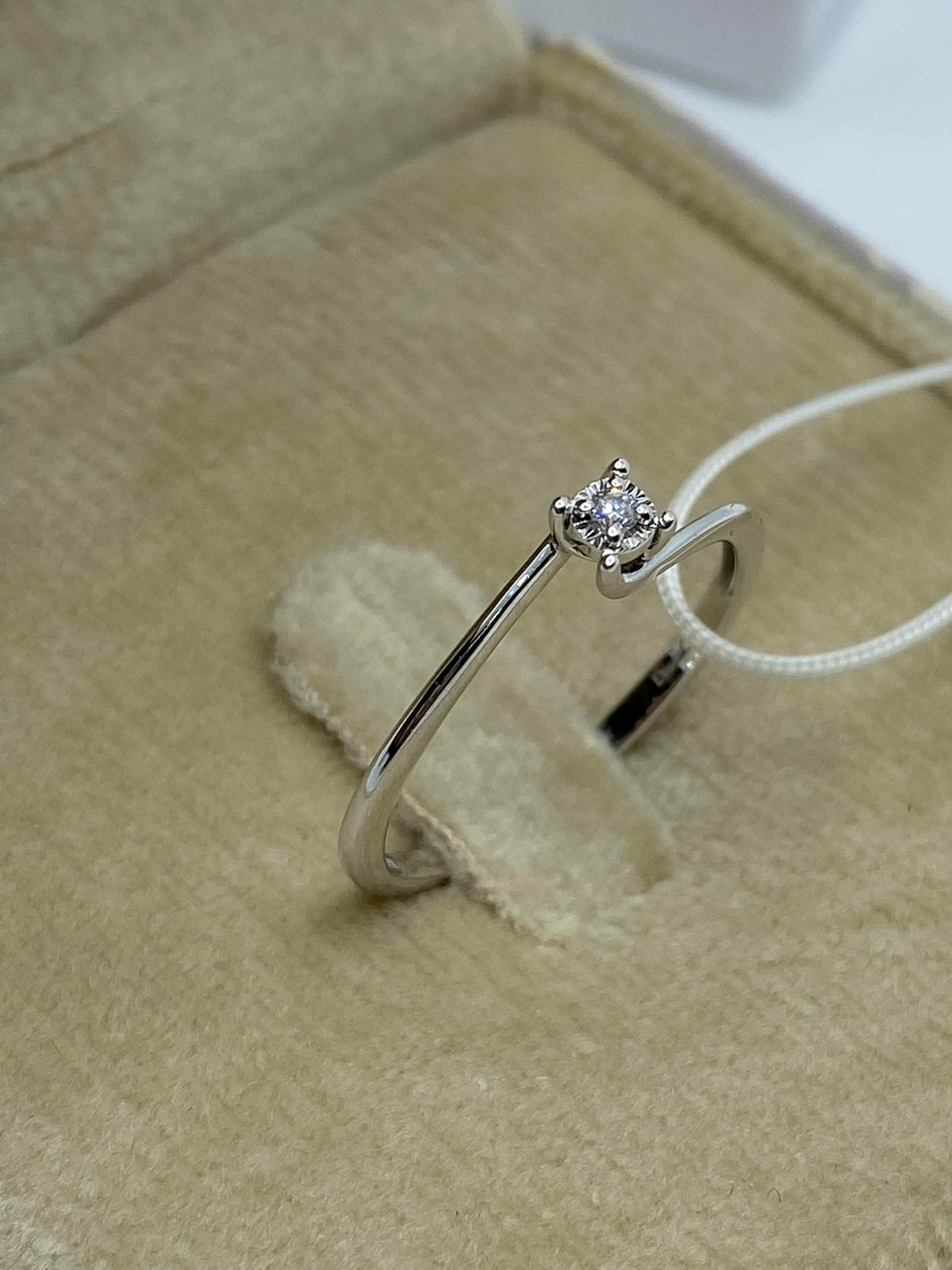 18KT Gold Women's Solitaire Ring with 0.02 Ct. Diamond