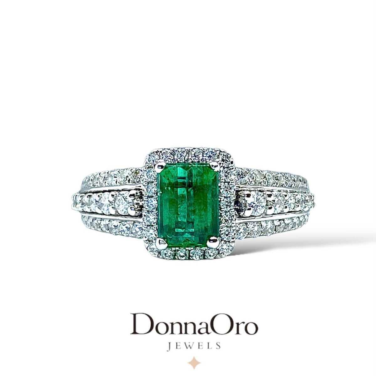Anello Donna Oro 18KT con smeraldo Ct. 0.90 e diamanti