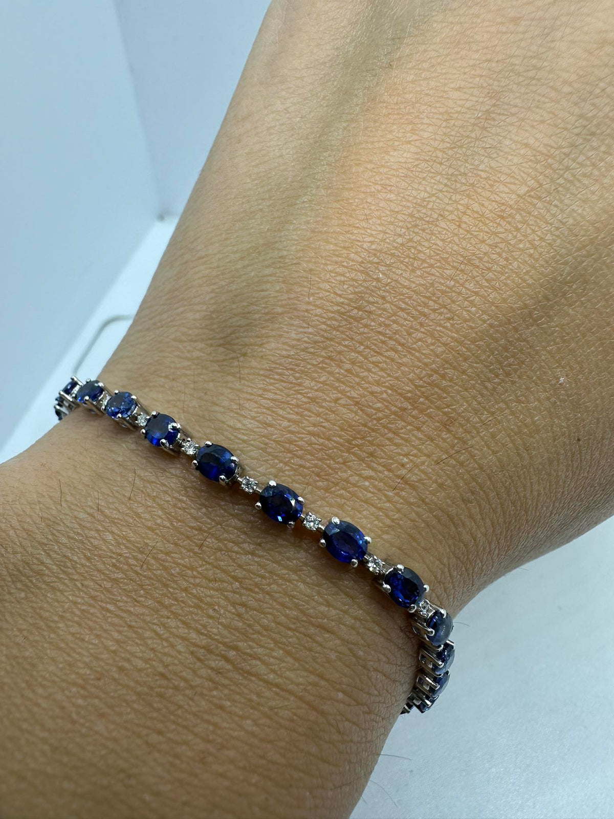 Bracciale Tennis Donna Oro 18KT con Diamanti ct 0.22 e Zaffiri Ct. 5.70