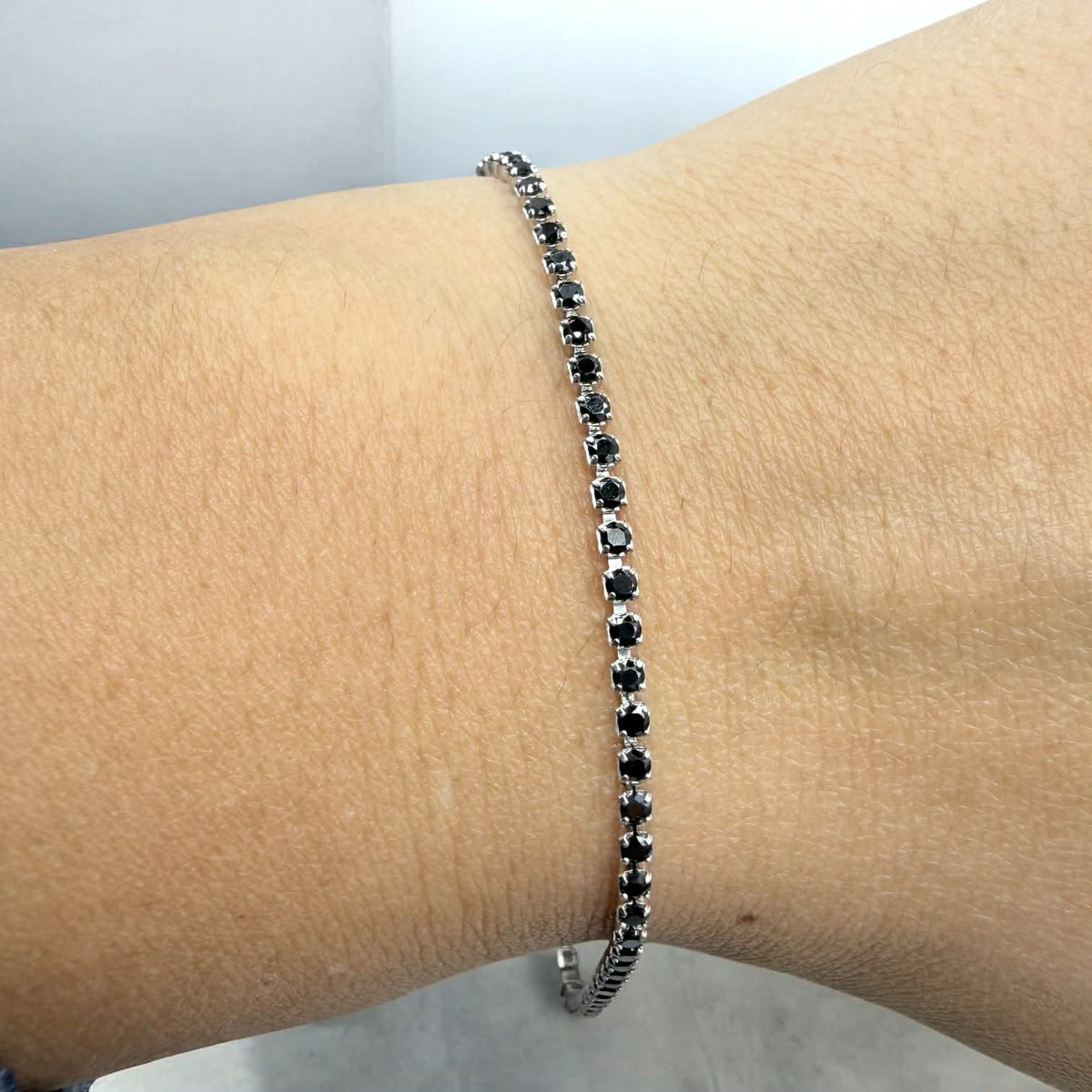 Bracciale Tennis in Oro 18KT 18KT e Zirconi Neri