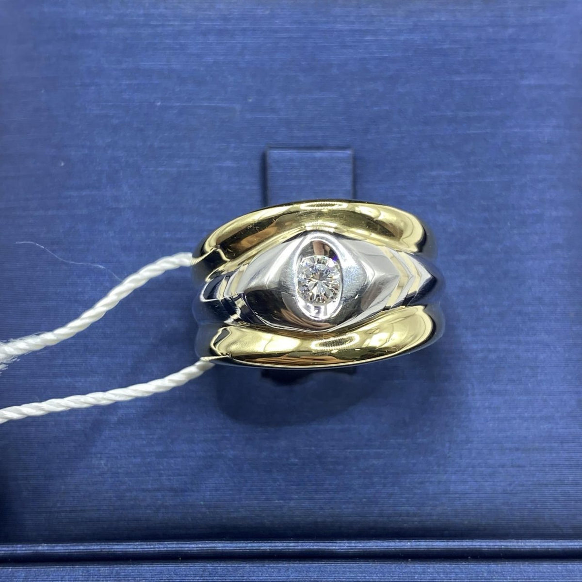 Anello a Fascia in Oro 18KT Bicolore con Diamante